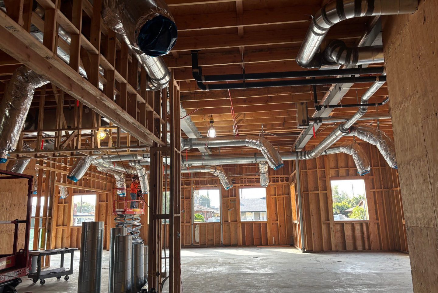 Mechanical ductwork routed through the finished framing