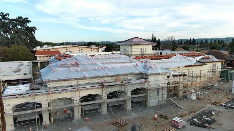 Roof tile and stucco going on over the frame, January 2026