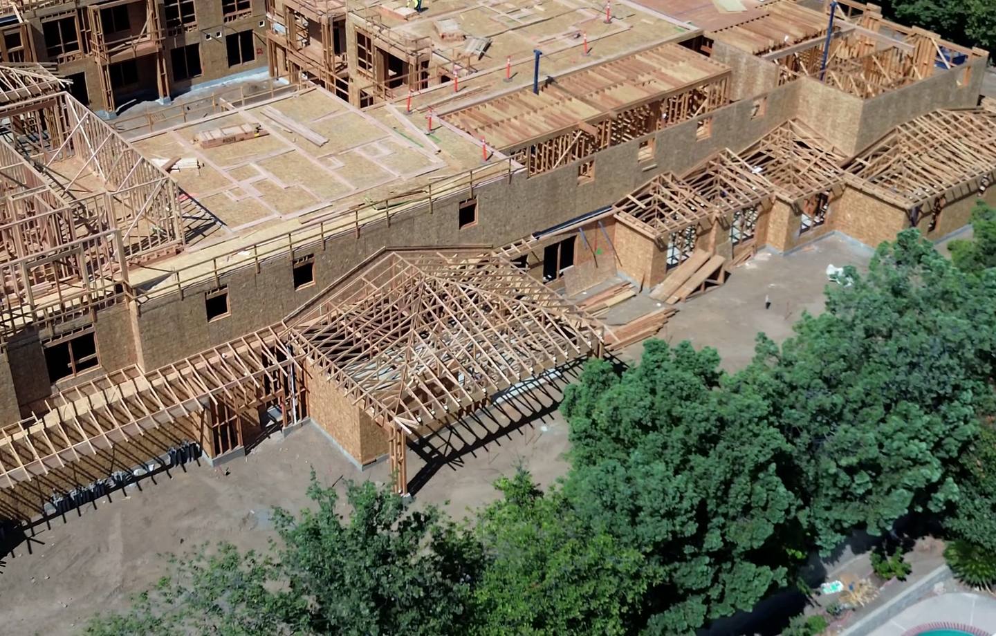 Rooflines and gable trusses across the Ivy from above