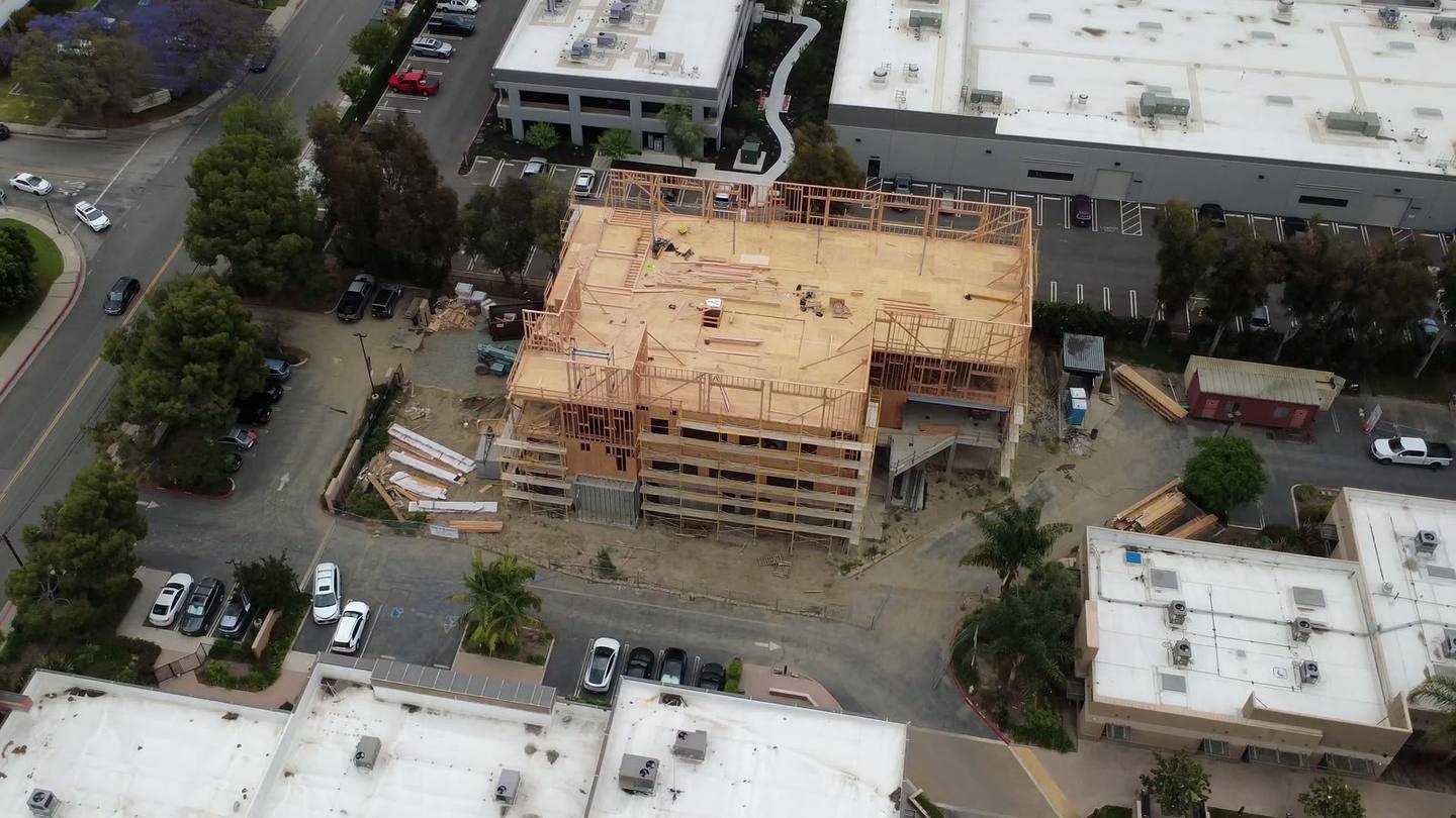 Logos Building D from directly above, framing on the top deck