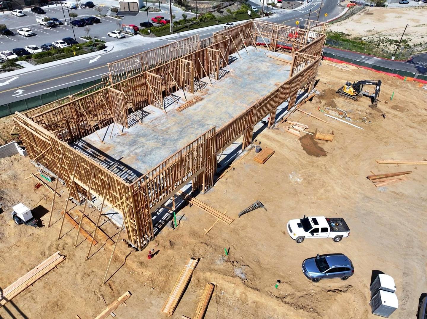 Walls rising on the next building